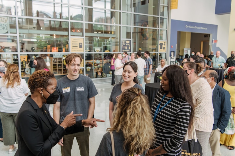 Meet and greet students, faculty, and staff on Main Street.