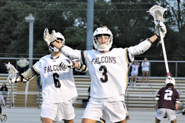 Severna Park sophomore Jack Fish (3) celebrates with teammate Alex Stroble after scoring his third goal of the game during the fourth period of Wednesday's Class 3A state boys lacrosse quarterfinal match with Towson. The No. 11 and defending state champ Falcons rallied for an 8-5 victory over the Generals to advance this weekend's state semifinals.