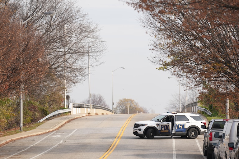 Baltimore Police block the road at East Fort Avenue leading to Fort McHenry on Friday, after sending its bomb squad as a safety measure after crews dug up an old explosive device.