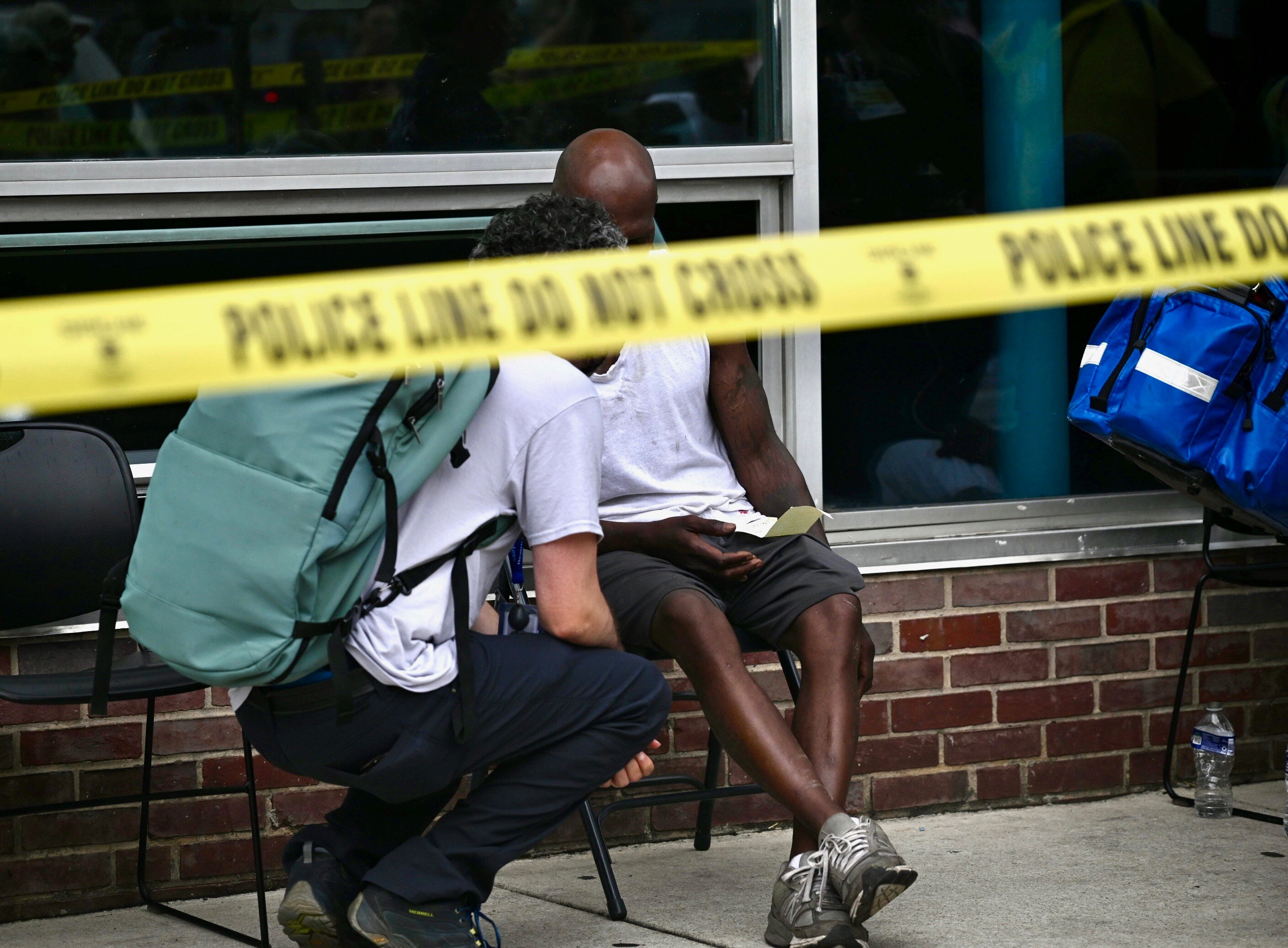 An overdose victim is treated in the triage area near Penn North metro station after Baltimore Police and Baltimore City Fire ⁩respond to a call for multiple people experiencing overdose symptoms at the intersection of Pennsylvania & North avenues in West Baltimore on Thursday, July 10, 2025.