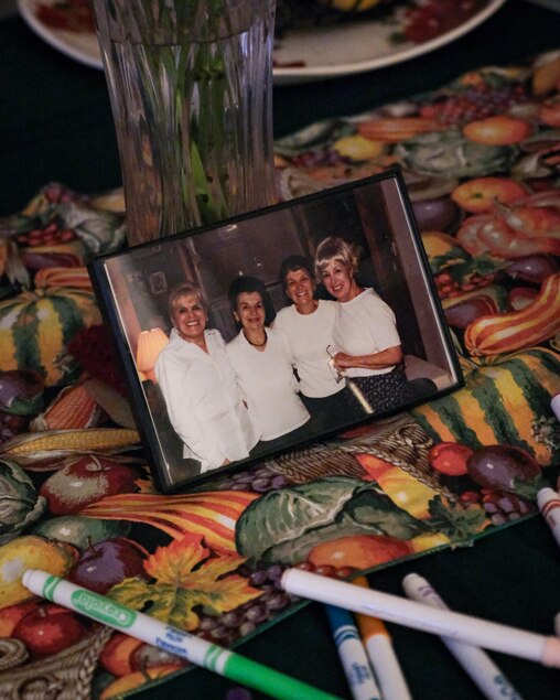 A portrait of the Torre sisters, also known as the “Sisters of Kenwood Avenue,” on a dining room table at the Dobry home.