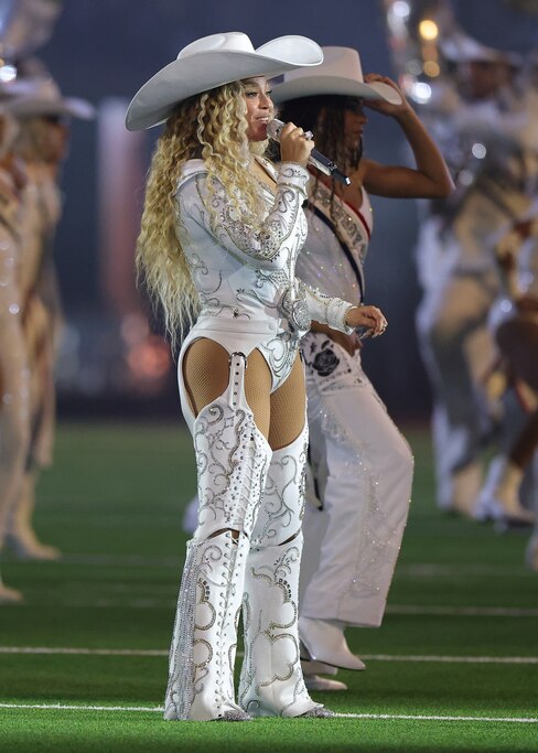 HOUSTON, TEXAS - DECEMBER 25: Beyoncé performs with daughter, Blue Ivy, during the halftime show for the game between the Baltimore Ravens and the Houston Texans at NRG Stadium on December 25, 2024 in Houston, Texas. (Photo by Alex Slitz/Getty Images)