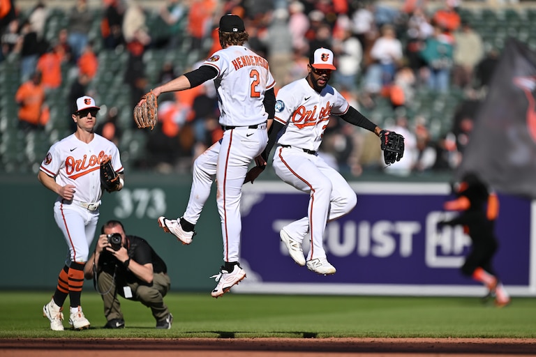 BALTIMORE, MD - MARCH 29: Gunnar Henderson #2 and Leody Taberas #30 of the Baltimore Orioles celebrate after defeating the Minnesota Twins 8-6 at Oriole Park at Camden Yards on March 29, 2026 in Baltimore, Maryland.
