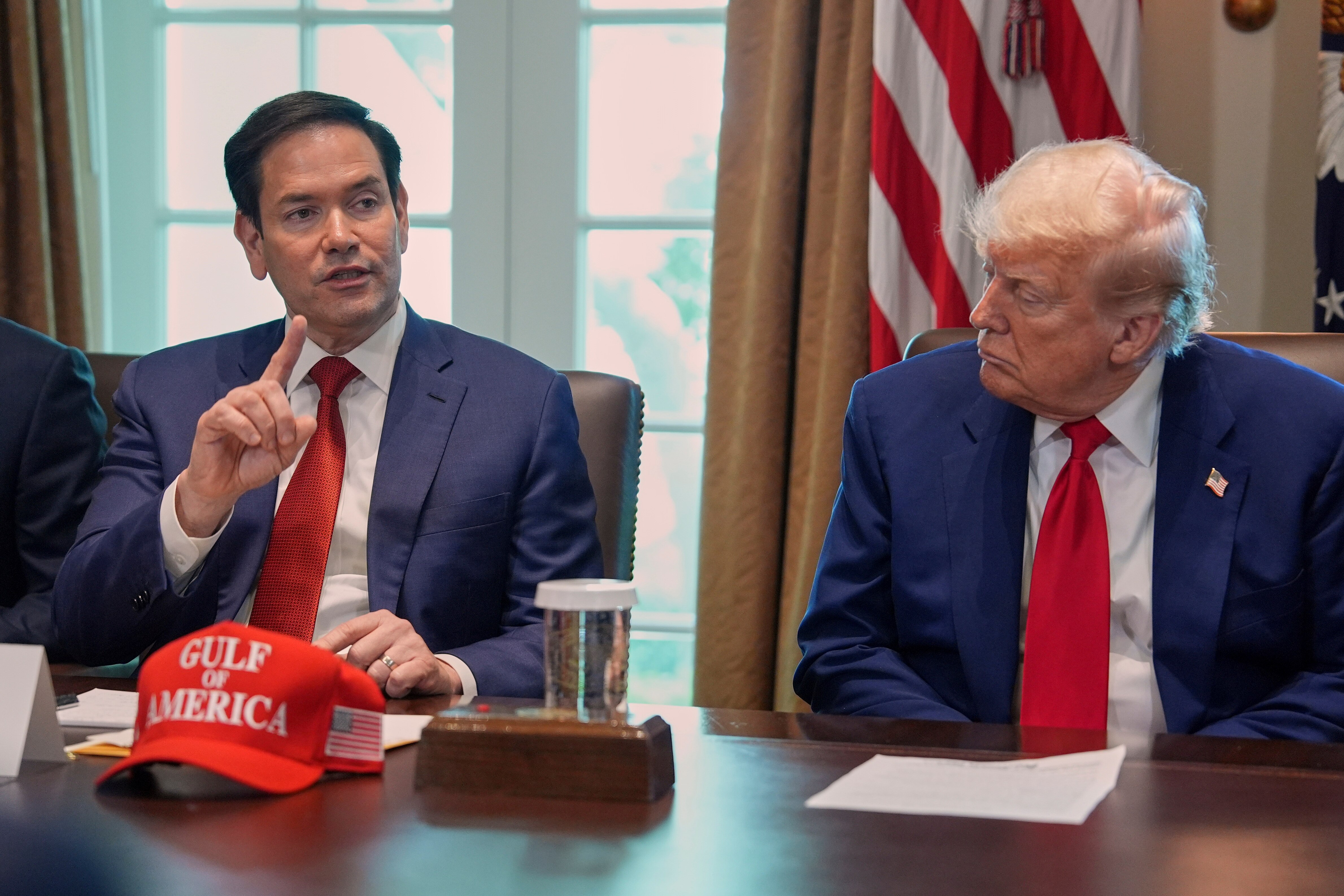 Secretary of State Marco Rubio speaks during a cabinet meeting at the White House, Wednesday, April 30, 2025, in Washington, as President Donald Trump look on.