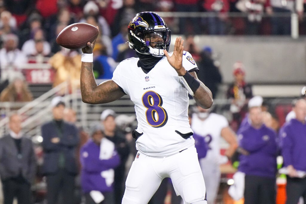 Lamar Jackson, #8 of the Baltimore Ravens, attempts a pass during the first quarter against the San Francisco 49ers at Levi's Stadium on Dec. 25, 2023 in Santa Clara, California. (Photo by Loren Elliott/Getty Images)