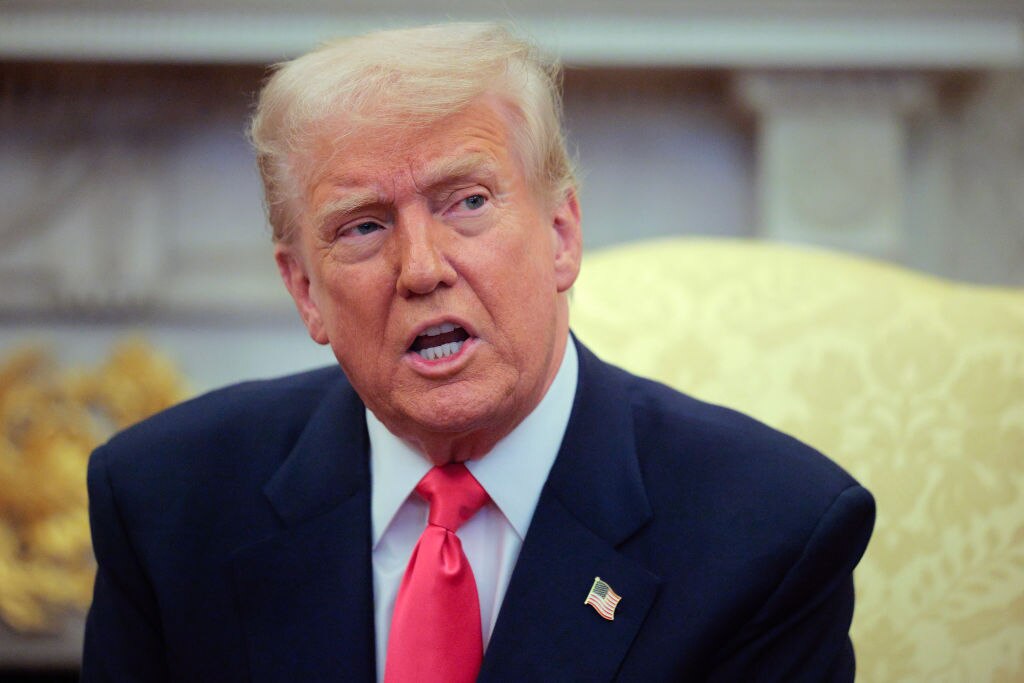 U.S. President Donald Trump answers reporters' questions while hosting Irish Taoiseach Micheal Martin in the Oval Office at the White House on March 12, 2025 in Washington, DC.