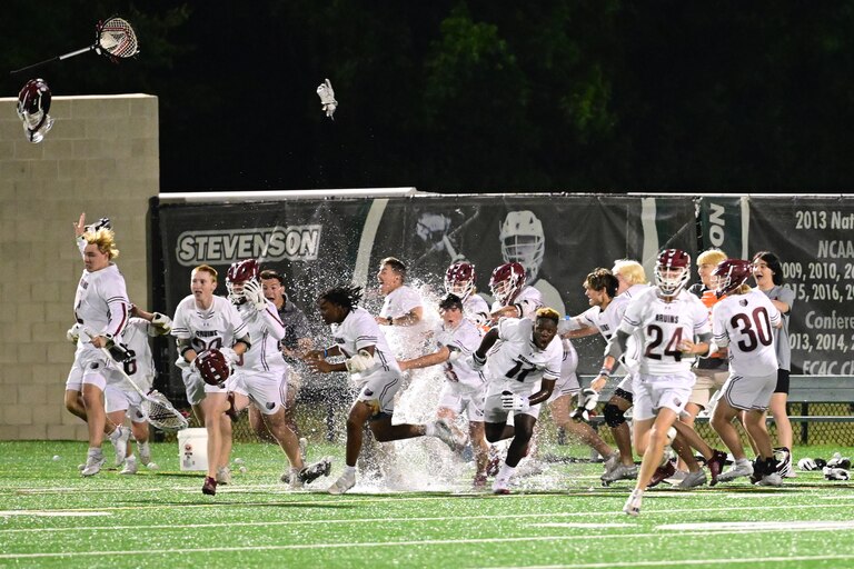 With ice and water showering down, the Broadneck bench races onto the field at the final horn to celebrate their team's 16-6 victory over Sherwood in the Class 4A boys lacrosse state championship game at Stevenson University.