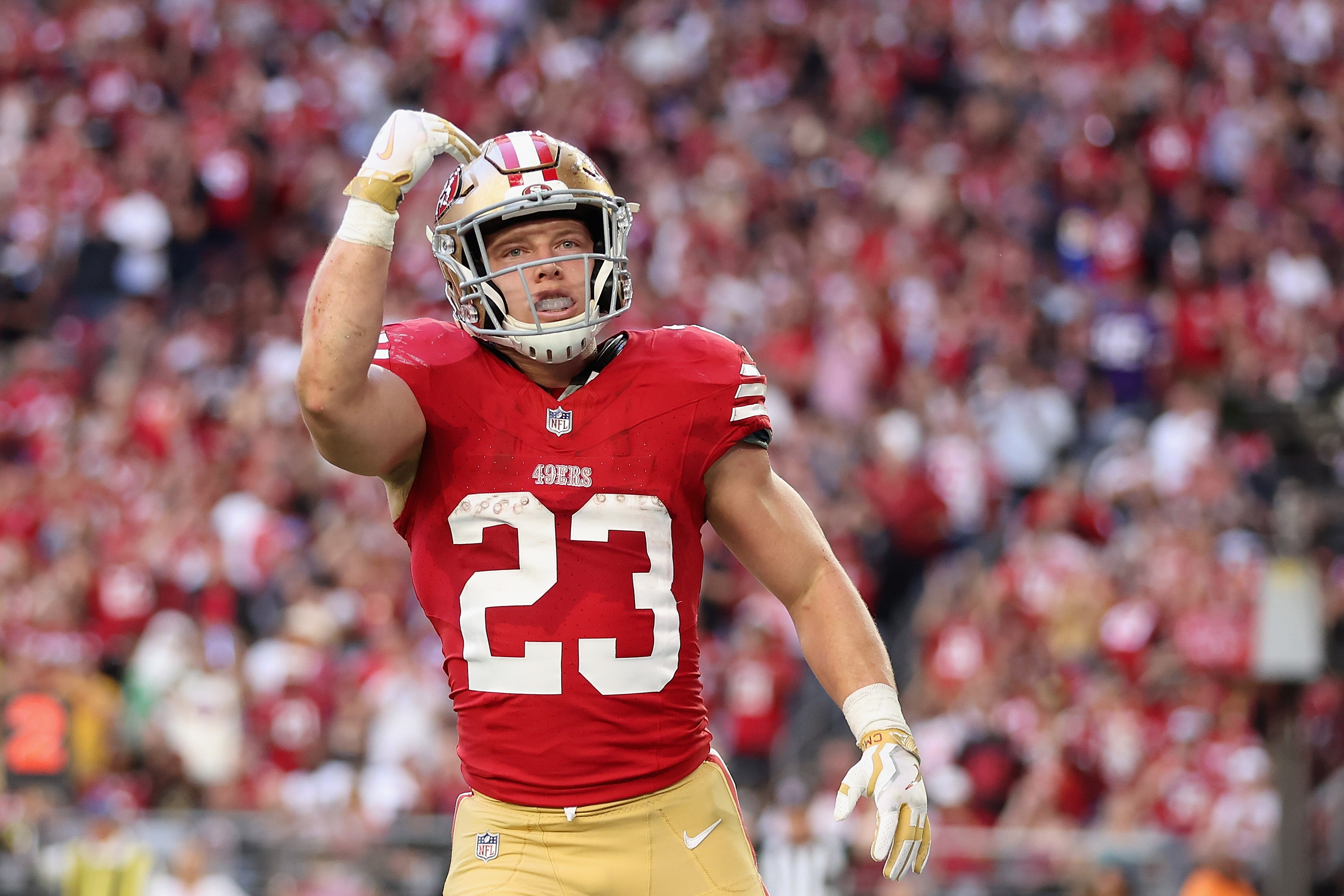 The 49ers' Christian McCaffrey leads the NFL in rushing yards with 1,292 and total touchdowns with 20.