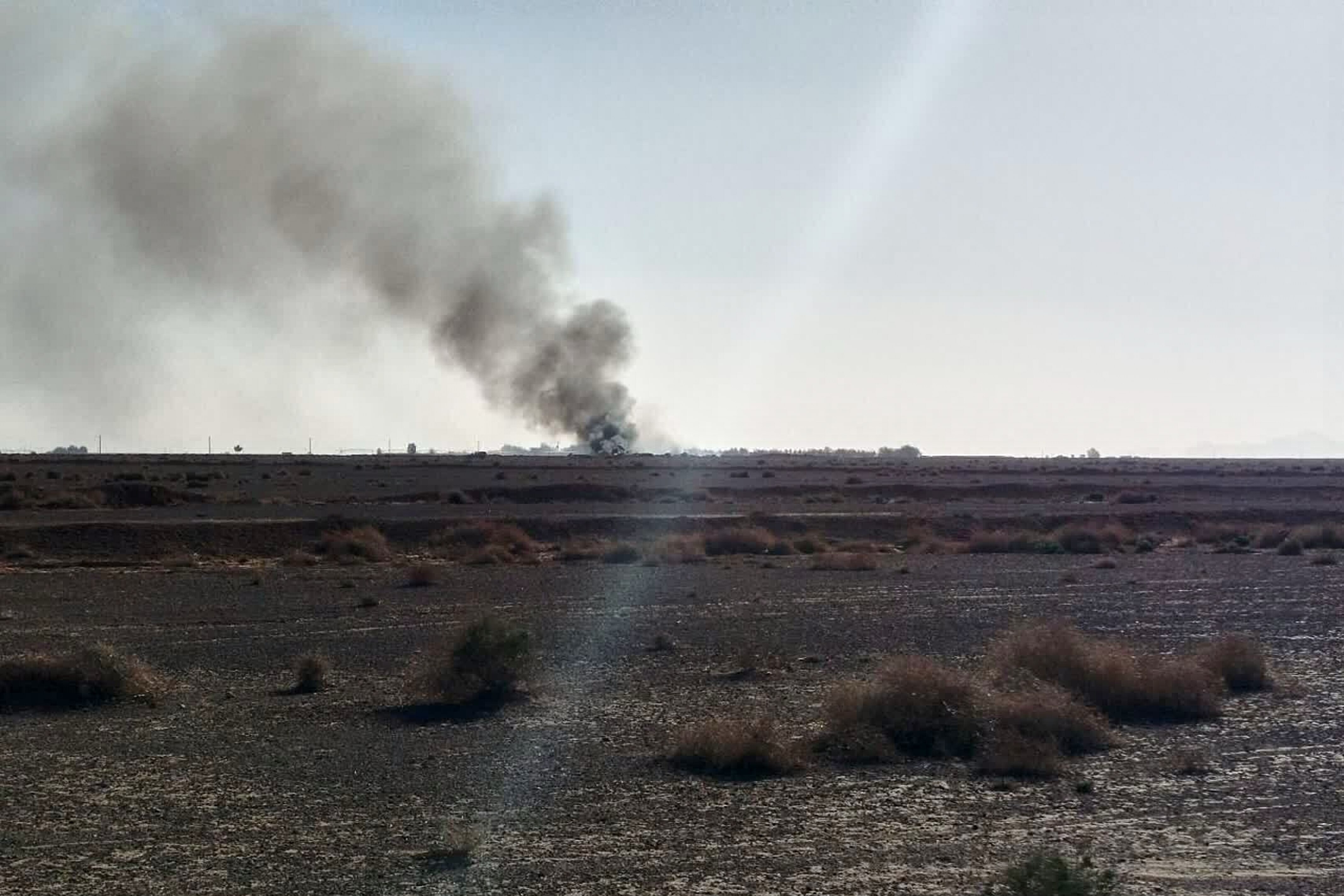This image, taken by Sepahnews, Iranian state media, shows black smoke rising from the spot Iran claims that two United States aviators crashed during an operation over Isfahan province, Iran.