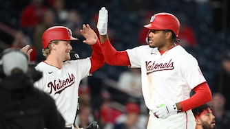 Washington Nationals' James Wood, right, celebrates after his three-run home run with Joey Wiemer, left, during the eighth inning.