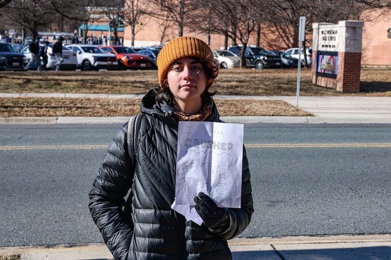 Viraaj Raofield, 18, a senior at Walt Whitman High School, poses for a portrait during a walkout at the school in Bethesda, MD. The walkout, organized by the Sunrise Movement, expressed students’ outrage over ICE’s expanding police authority and use of aggressive tactics.
