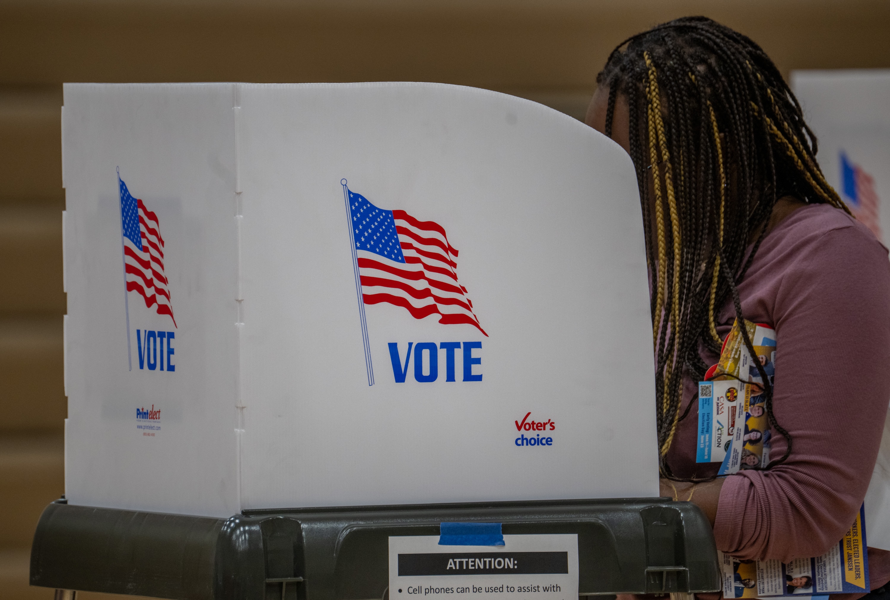 A voter casts her ballot at River Hill High School in Howard County on Tuesday.
