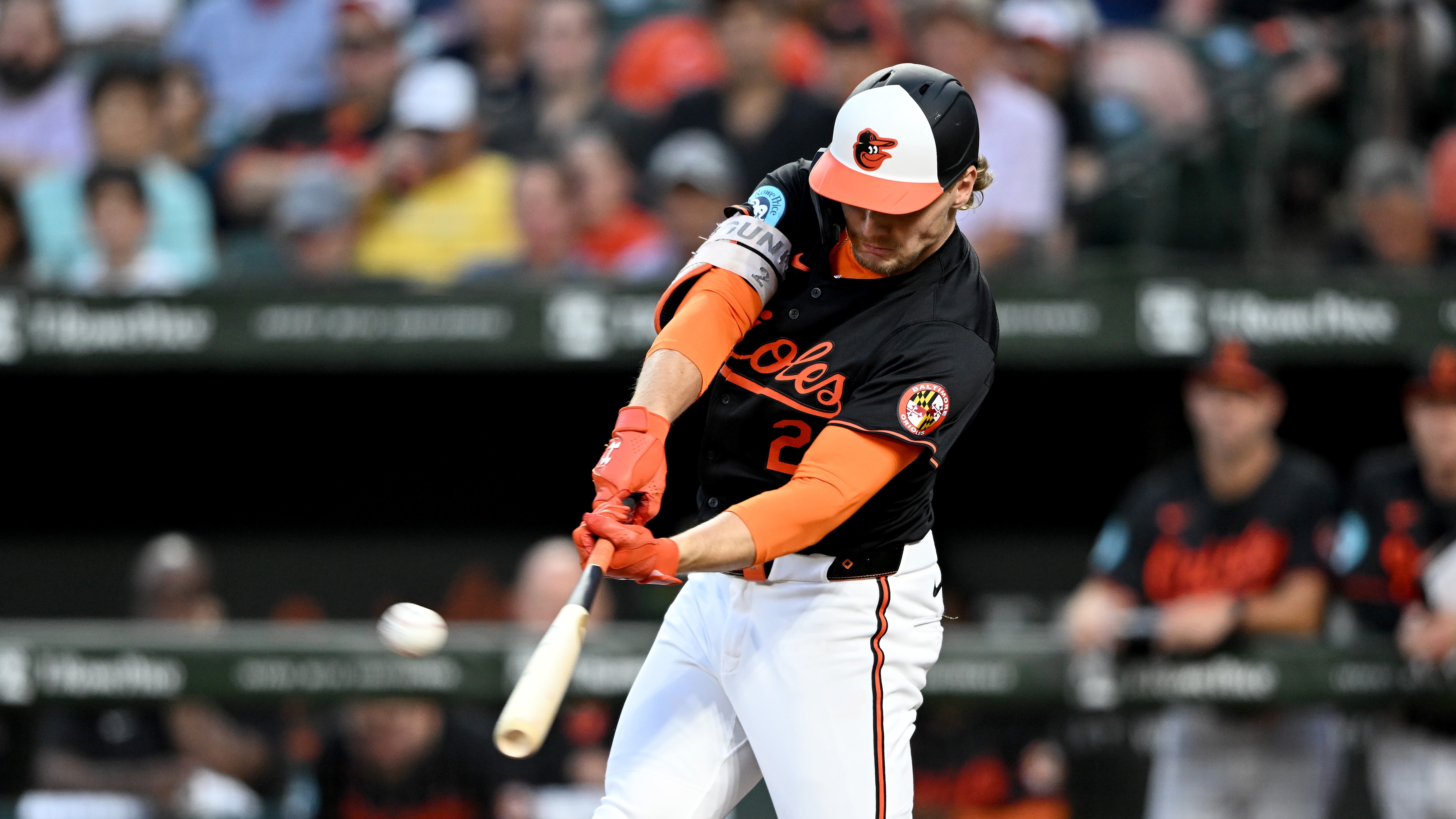 BALTIMORE, MARYLAND - AUGUST 15: Gunnar Henderson #2 of the Baltimore Orioles hits a two-run home run in the fourth inning against the Boston Red Sox at Oriole Park at Camden Yards on August 15, 2024 in Baltimore, Maryland.