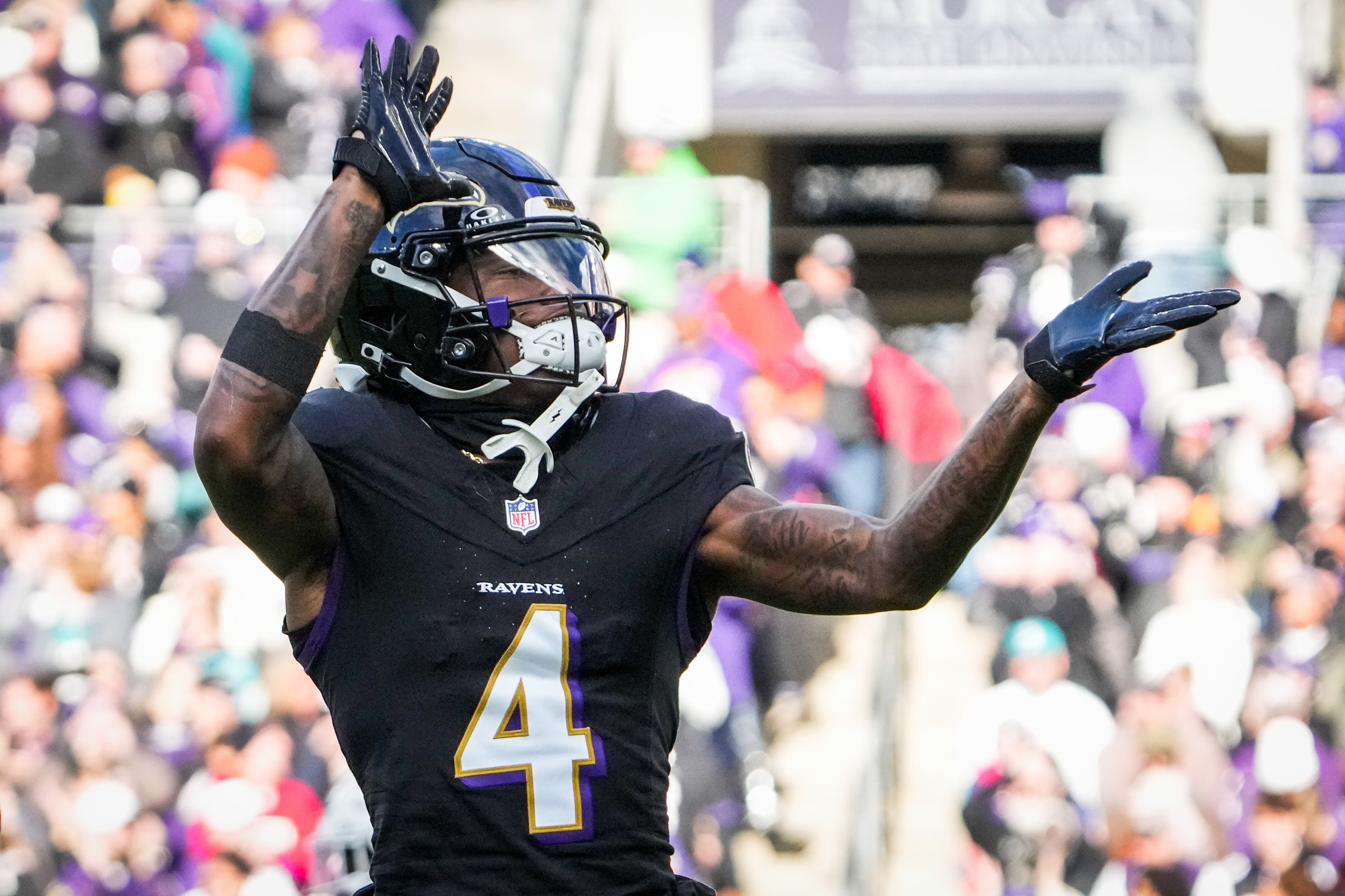 Baltimore Ravens wide receiver Zay Flowers (4) celebrates after scoring a touchdown during the second quarter against the Miami Dolphins at M&T Bank Stadium on Sunday, Dec. 31, 2023.