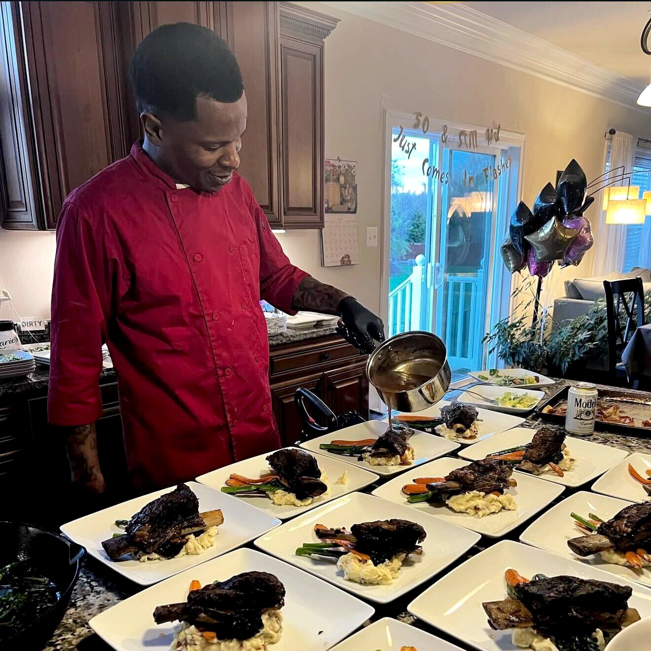 Alex Claro prepares a short rib dish.