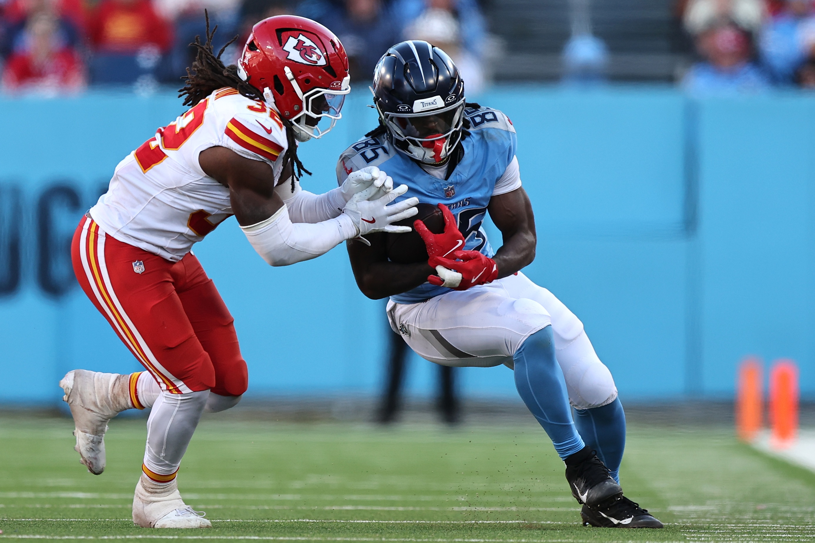 Former Titans tight end Chig Okonkwo secures a catch against the Chiefs last season.