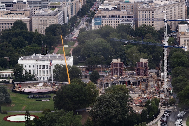 Construction continues on a helipad and the White House Ballroom on the South Lawn of the White House, Wednesday, Aug. 5, 2026, in Washington. (AP Photo/Tierney L. Cross)
