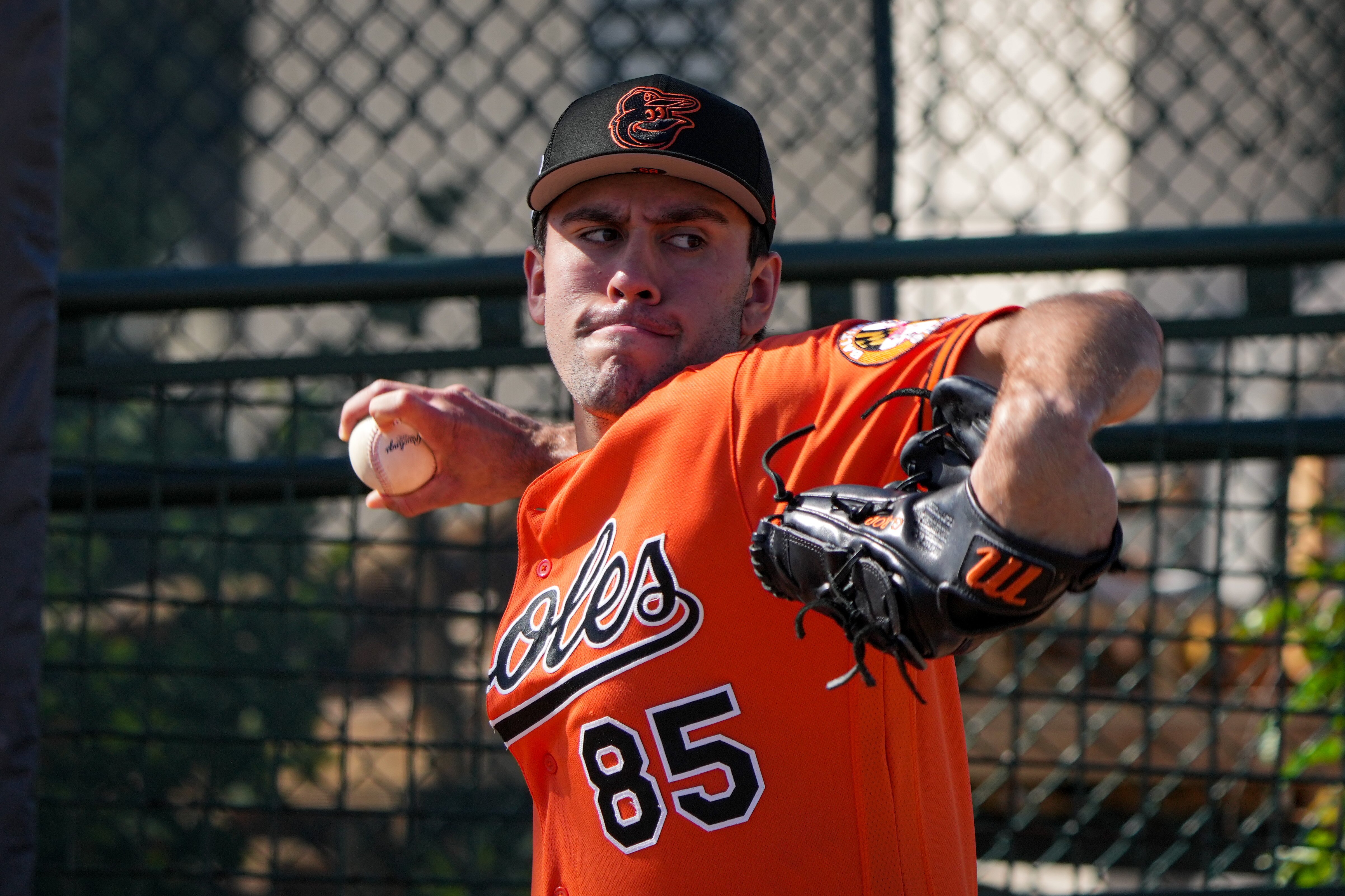 Grayson Rodriguez (85) delivers a pitch during practice at Ed Smith Stadium in Sarasota on 2/22/23. The Baltimore Orioles’ Spring Training session runs from mid-February through the end of March.