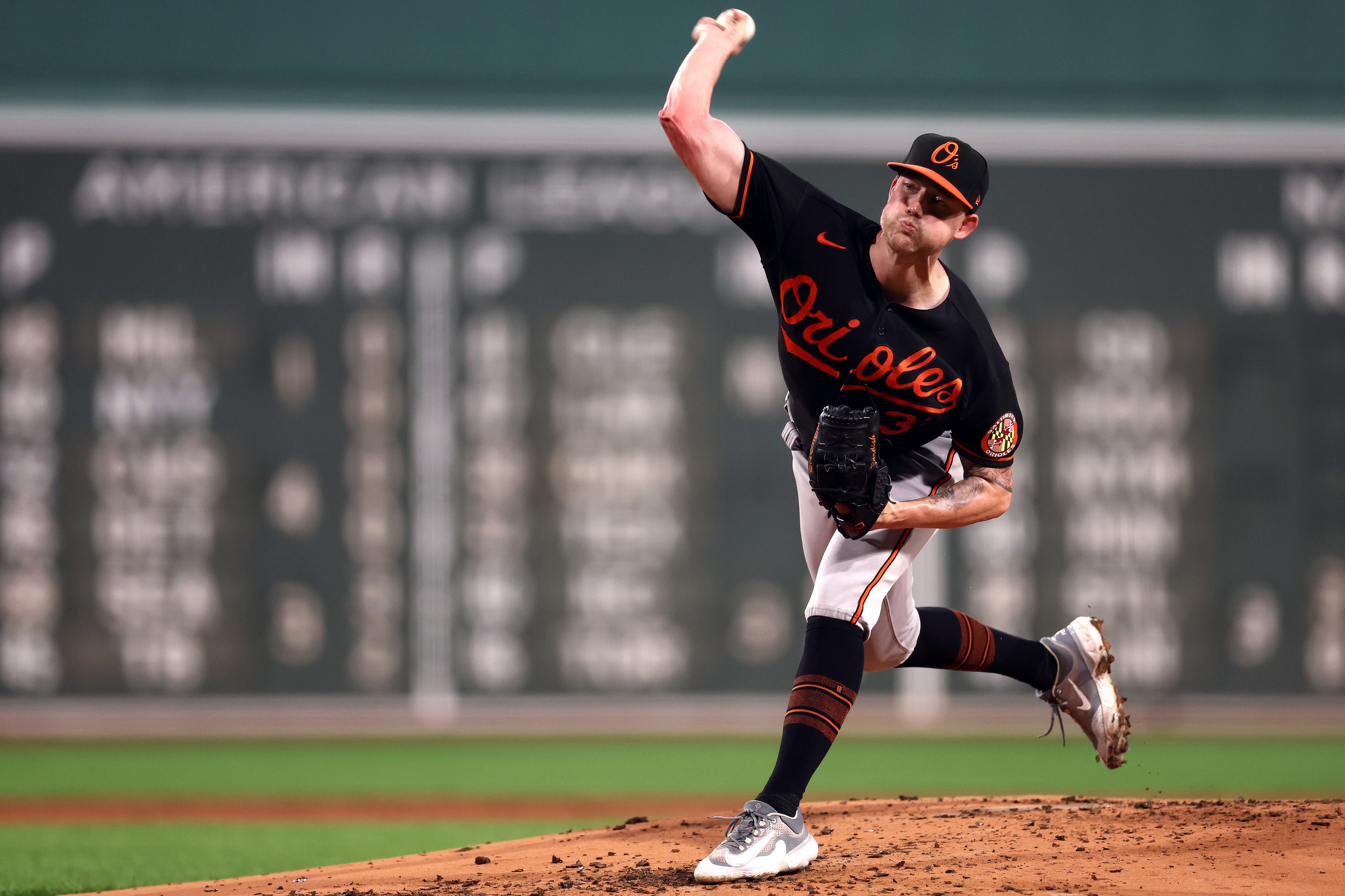 BOSTON, MASSACHUSETTS - SEPTEMBER 08: Starting pitcher Kyle Bradish #39 of the Baltimore Orioles throws against the Boston Red Sox during the first inning at Fenway Park on September 08, 2023 in Boston, Massachusetts. (Photo by Maddie Meyer/Getty Images)