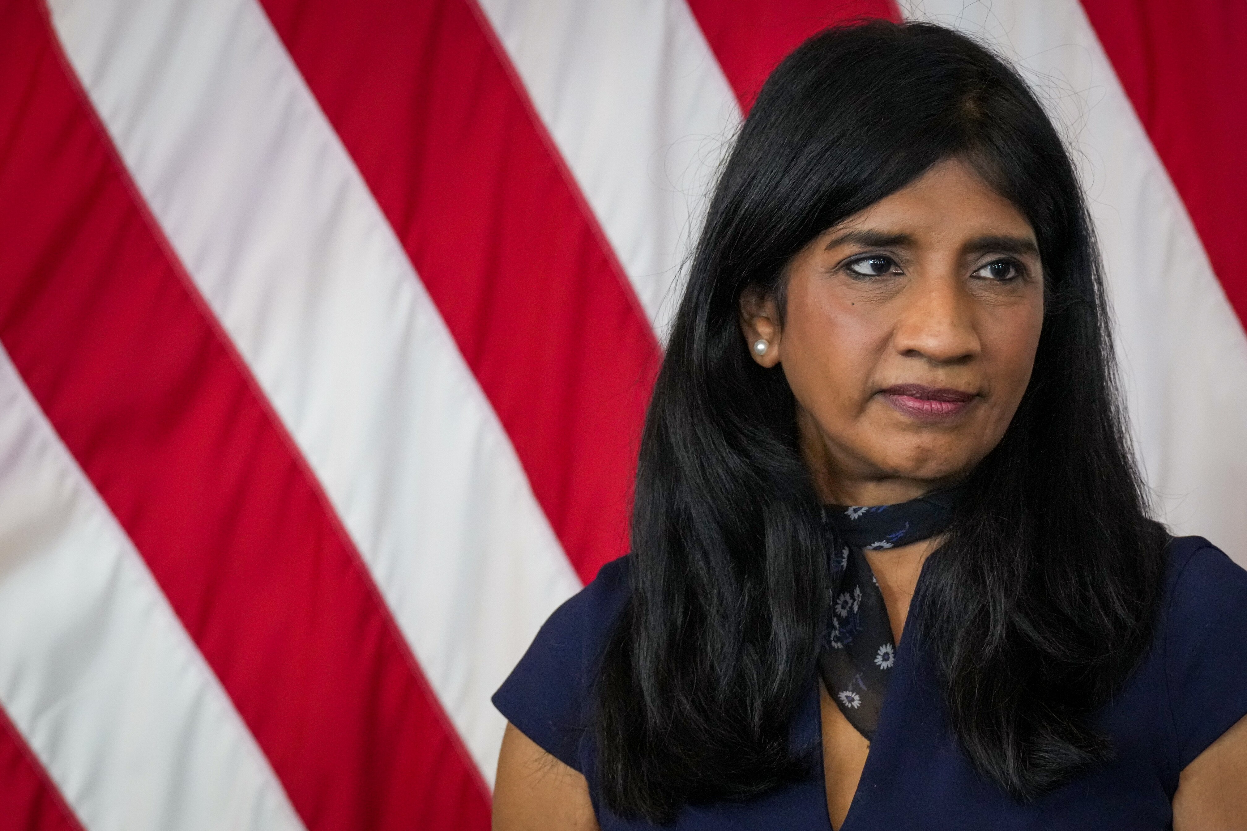 Lt. Gov. Aruna Miller listens at a press conference in the Maryland State House on Monday, April 3. Miller, a former Montgomery County traffic engineer, is leading administration efforts to improve road safety.