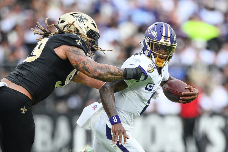 Baltimore Ravens quarterback Lamar Jackson is sacked by New Orleans Saints defensive end Chase Young (99) in the second half of an NFL football game in Baltimore, Sunday, Sept. 20, 2026. (AP Photo/Nick Wass)