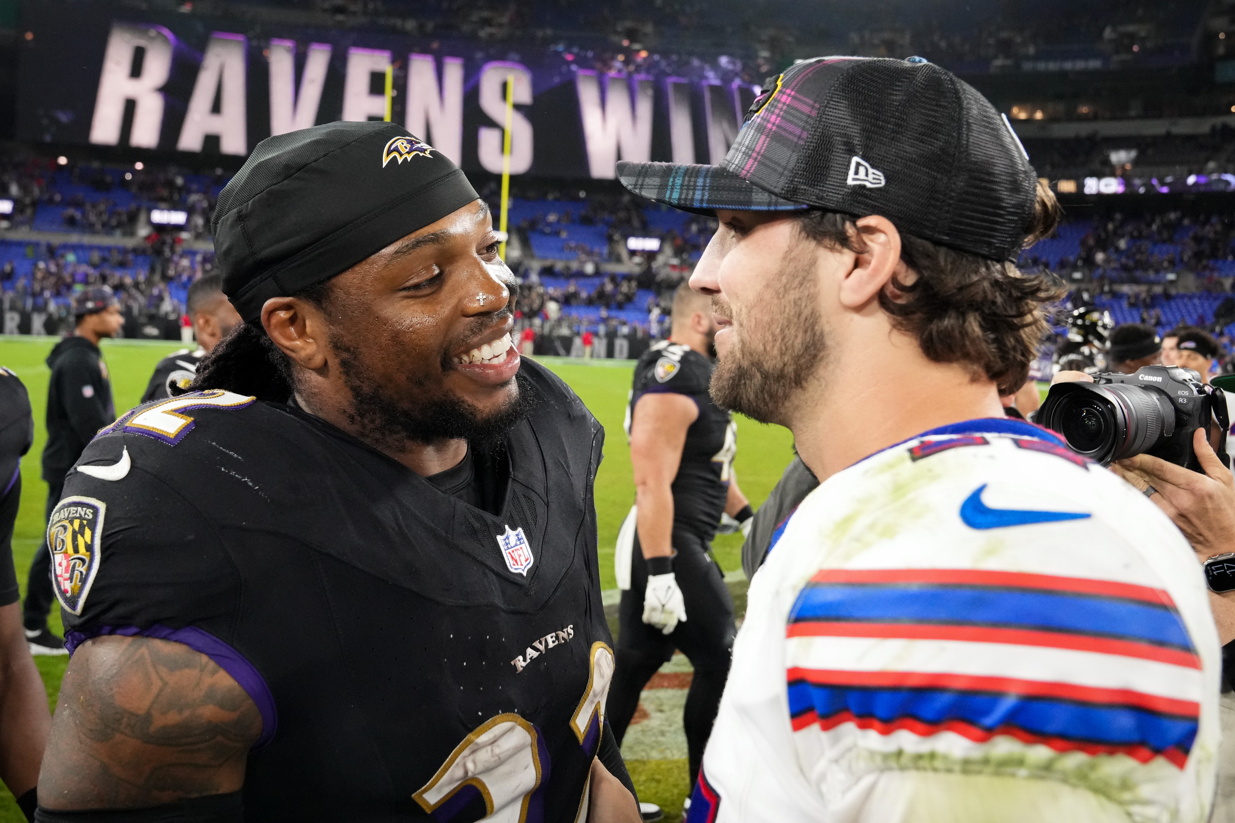Ravens running back Derrick Henry greets Bills quarterback Josh Allen after their game in Week 4.