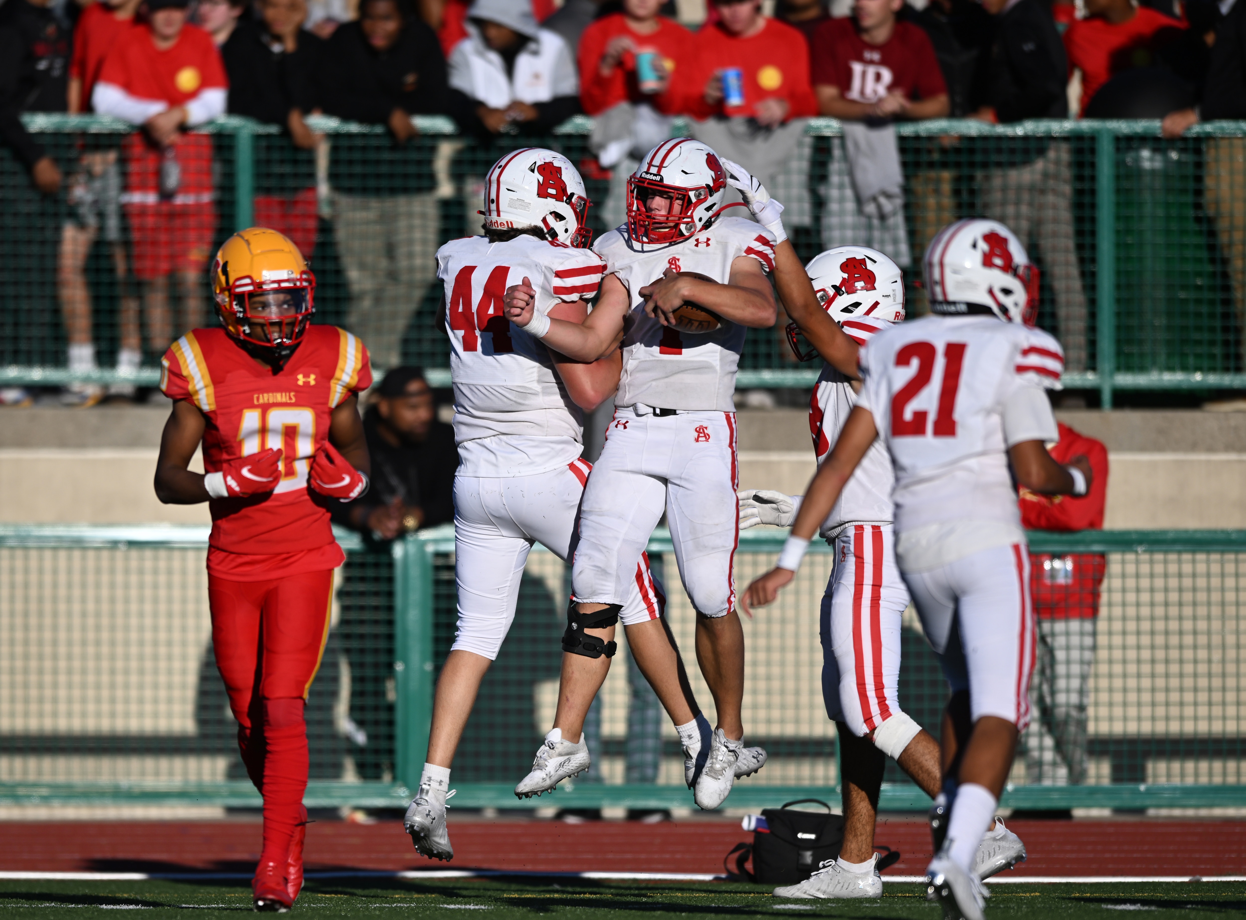 Paul Poknis celebrates his third quarter touchdown reception with teammate Liam McNemar, during Archbishop Spalding's 42-7 thumping of Calvert Hall, Friday.