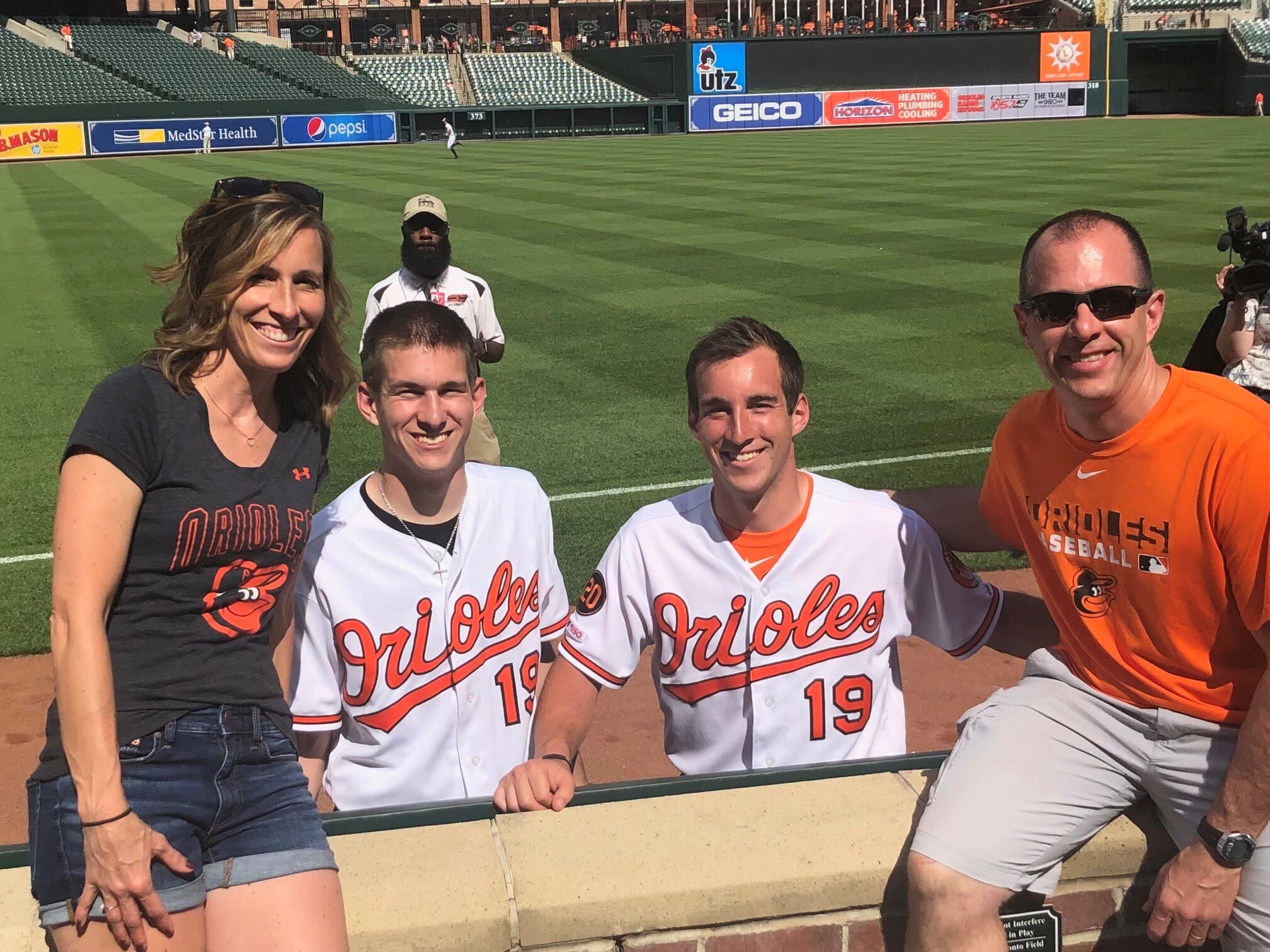 Tyler Smith (second from right with his family) has been an Orioles ball boy since 2019. (Courtesy photo)