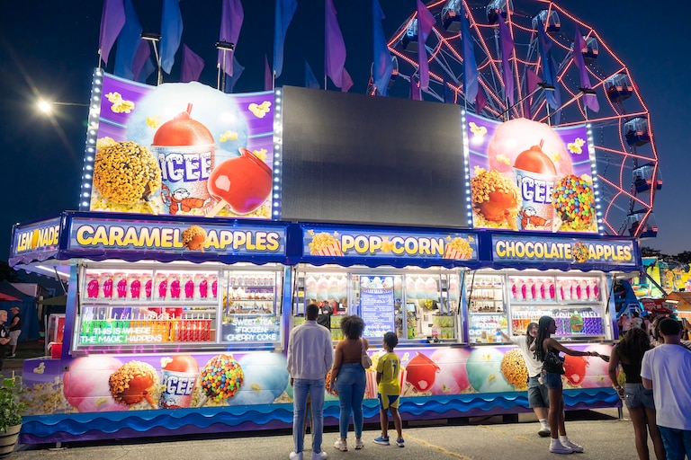 Menu highlights this year include crabby fries, Krispy Kreme burgers and the return of a New Orleans-style food booth.