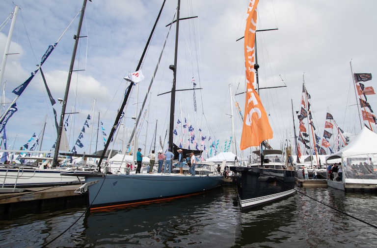Visitors take tours of sailboats docked in Downtown Annapolis during the city's Sailboat Show on Oct. 11, 2025.