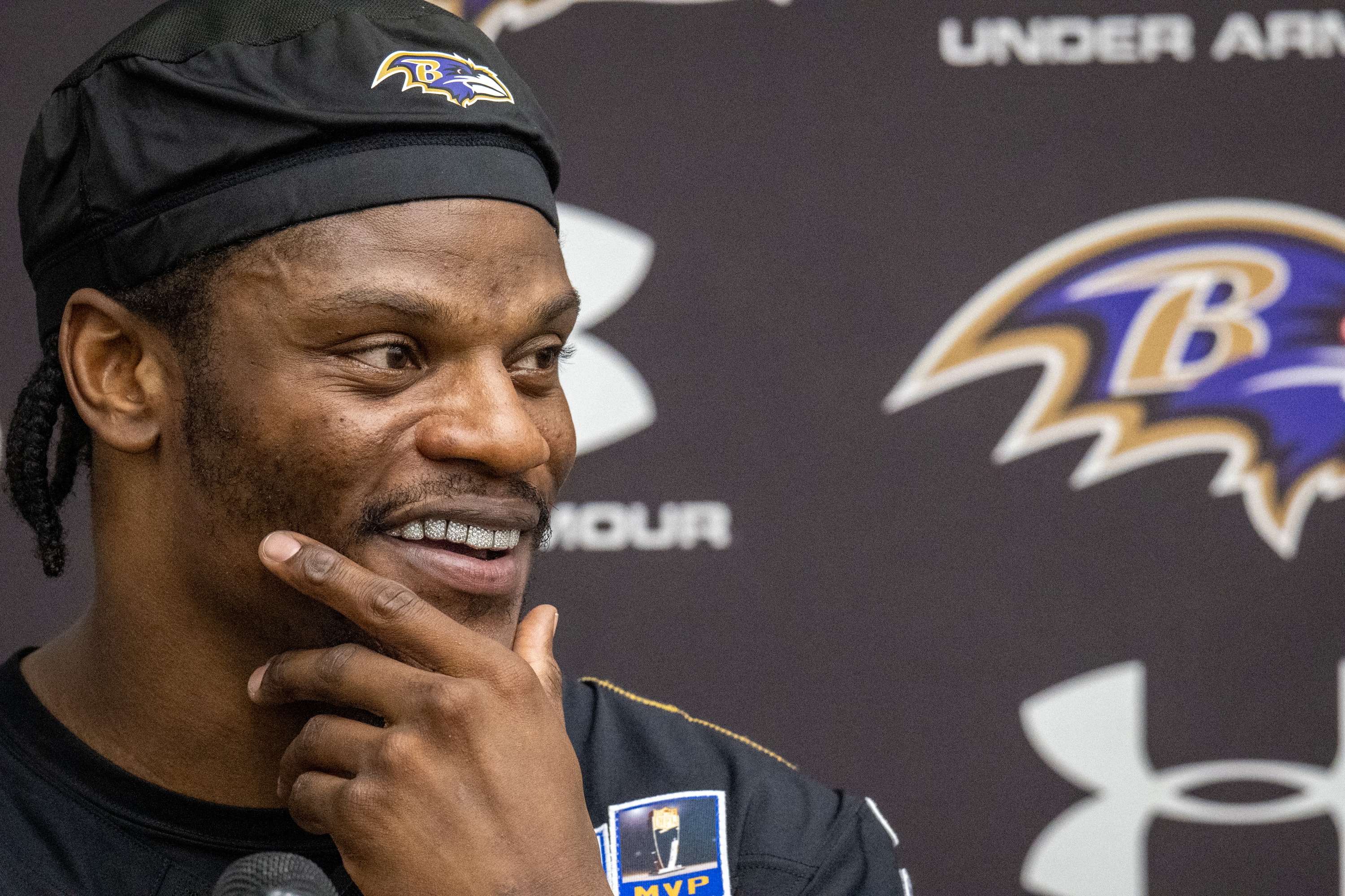 Ravens quarterback Lamar Jackson takes questions from reporters following organized team activities Wednesday.