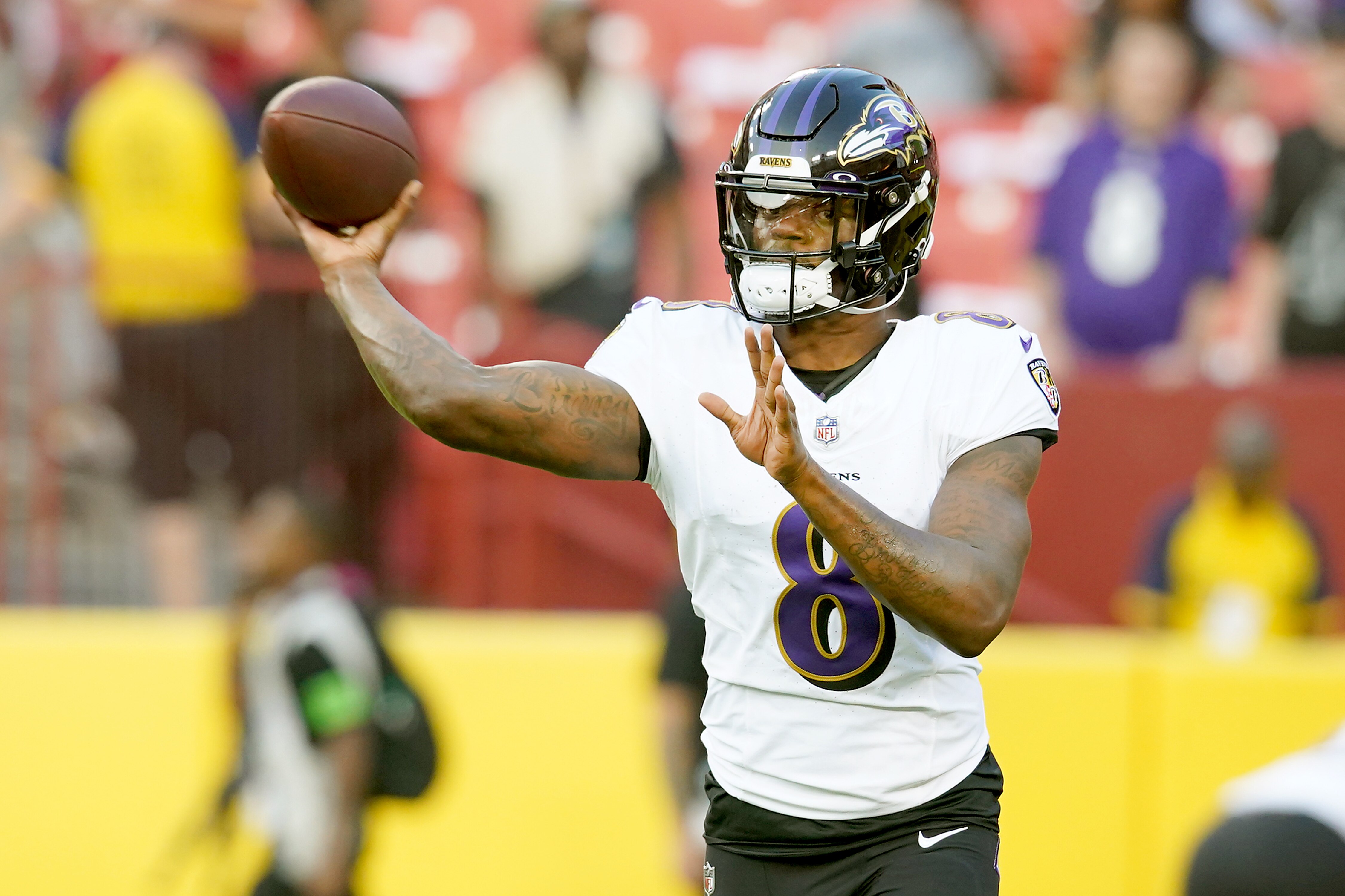 Baltimore Ravens quarterback Lamar Jackson (8) before a preseason game against the Washington Commanders at FedEx Field on Monday, August 21, 2023.