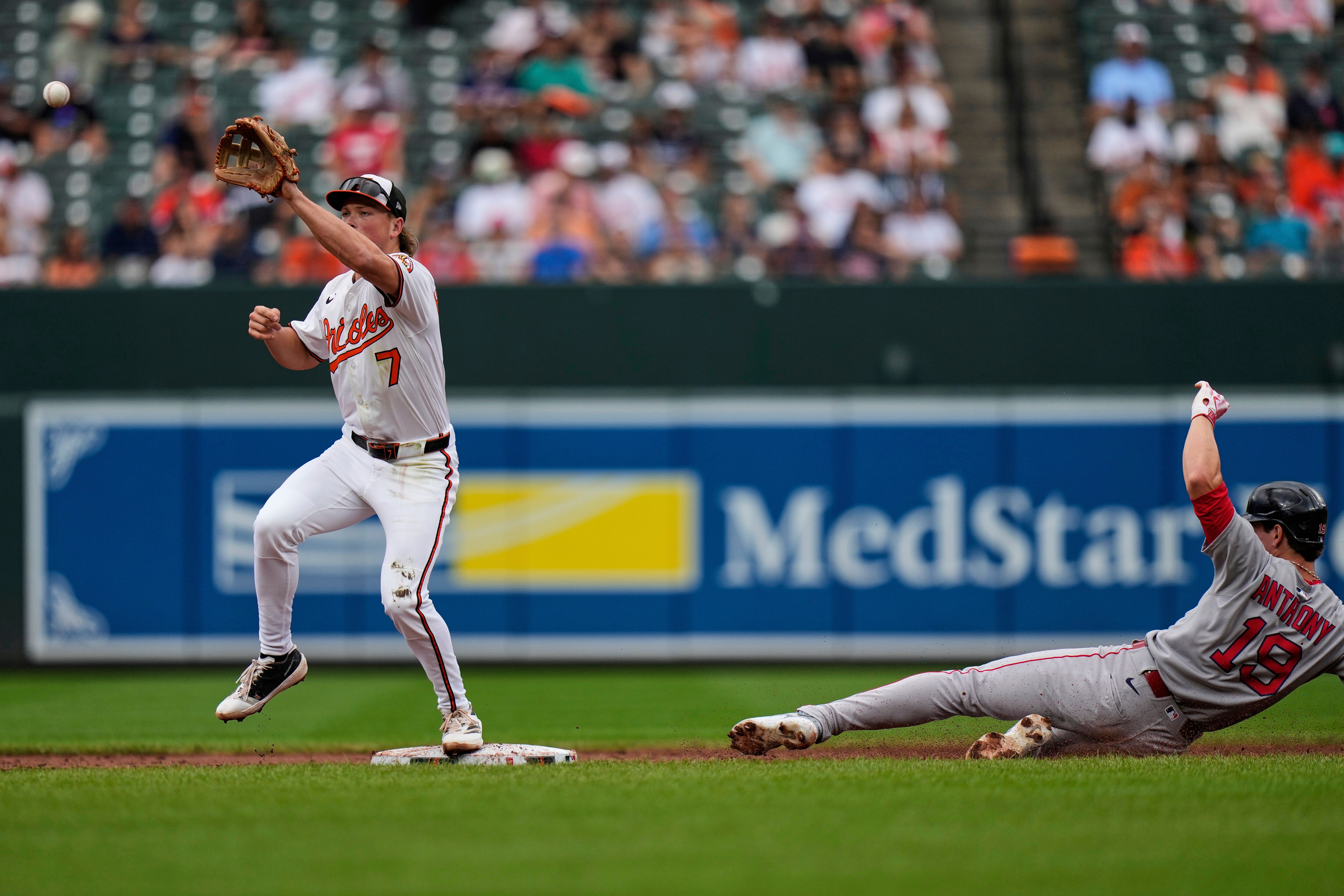Boston Red Sox's Roman Anthony (19) is forced out at second base by Baltimore Orioles second baseman Jackson Holliday (7) during the third inning