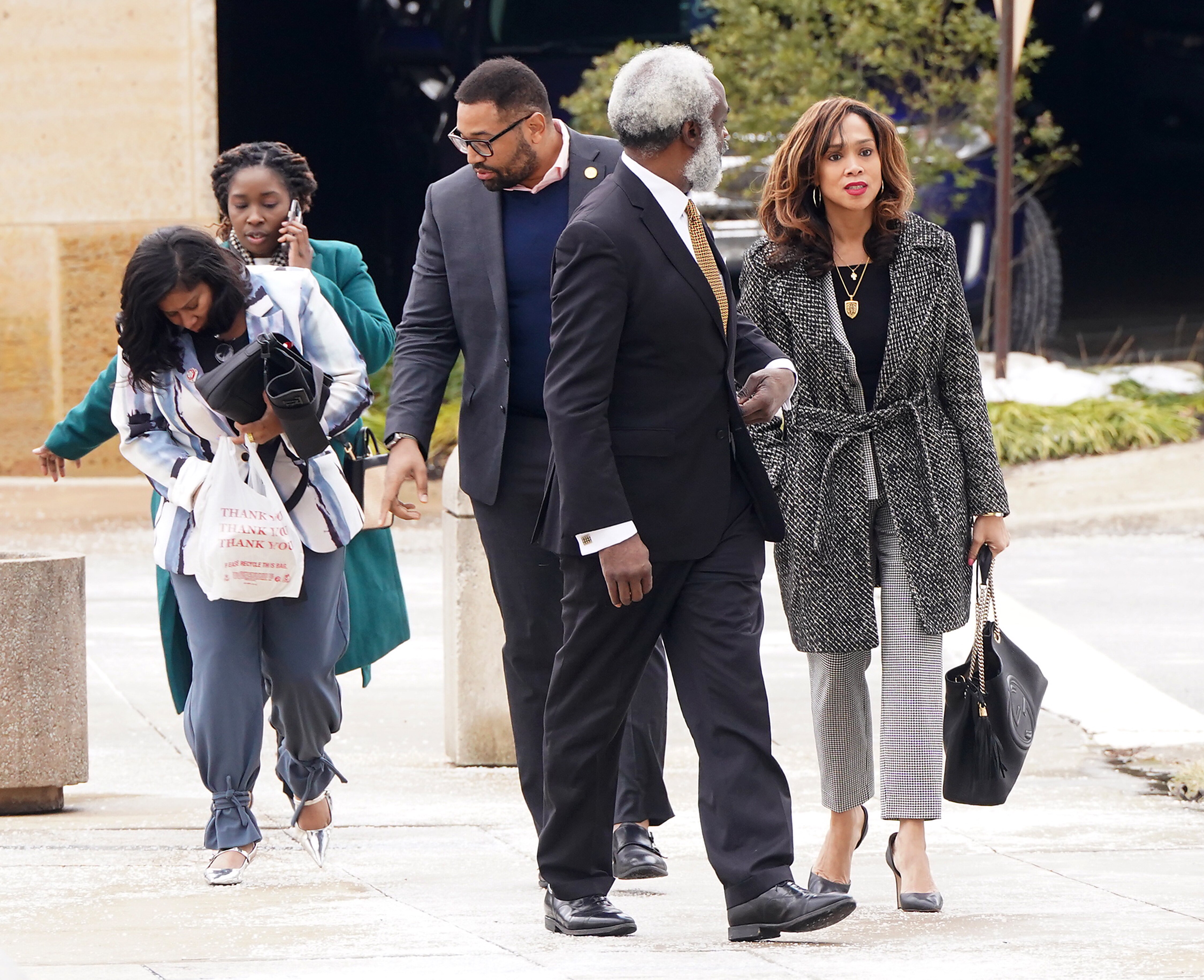 Former Baltimore State’s Attorney Marilyn Mosby, right, is standing trial in U.S. District Court in Greenbelt on two counts of making a false statement on a loan application related to her purchase of two luxury vacation homes in Florida.