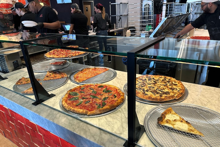 Aside from the traditional cheese, pepperoni and mushroom slices, Andy’s offers a selection of pricier specialty pies, including the fan-favorite pepperoni special with burrata, basil and a drizzle of hot honey. Taken on Wednesday, November 19, 2025.