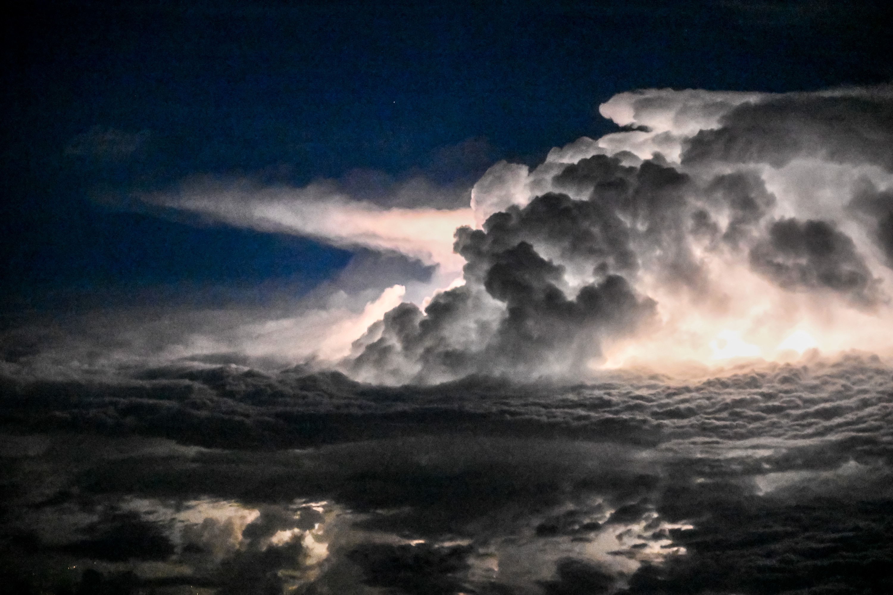 Lightning lights up storm clouds over Virginia as a line of severe thunderstorms pounded the East Coast on Tuesday evening.