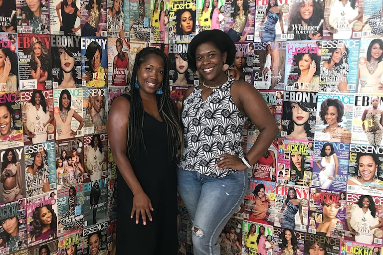 From left, Bobbie Hoye with her friend Megan Thomas at The Black Hair Experience, an interactive pop-up museum and art exhibit held at National Harbor in 2021.