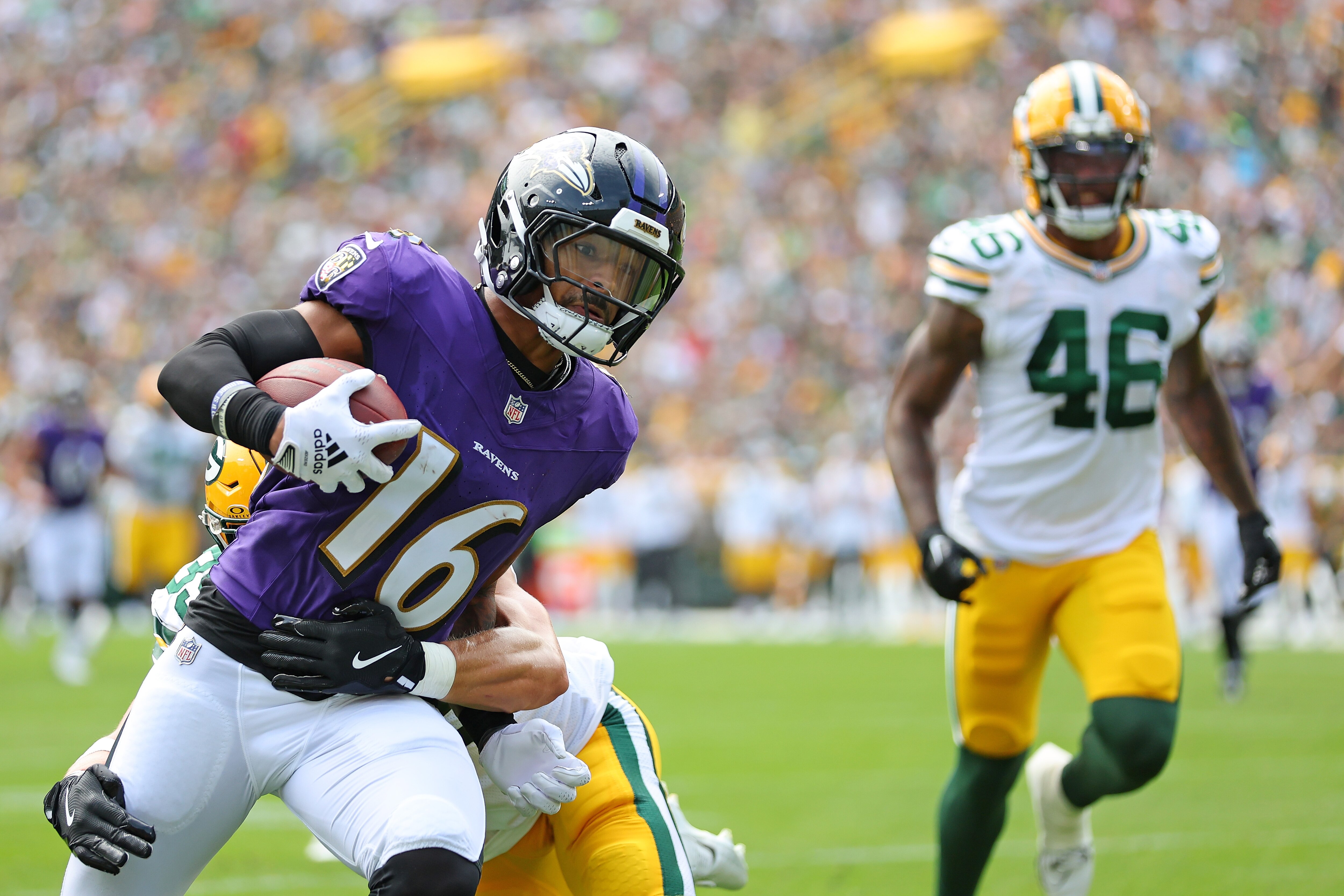 Tylan Wallace scores the Ravens’ touchdown Saturday in their 30-7 preseason loss to the Packers in Green Bay.