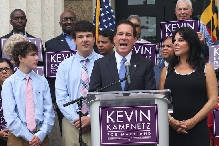 Baltimore County Executive Kevin Kamenetz announces he is joining the race for governor Monday, Sept. 18, 2017, in Towson, Md. Kamenetz is running in a crowded Democratic primary. From left are Kamenetz's sons, Dylan and Karson. His wife, Jill, is standing far right.