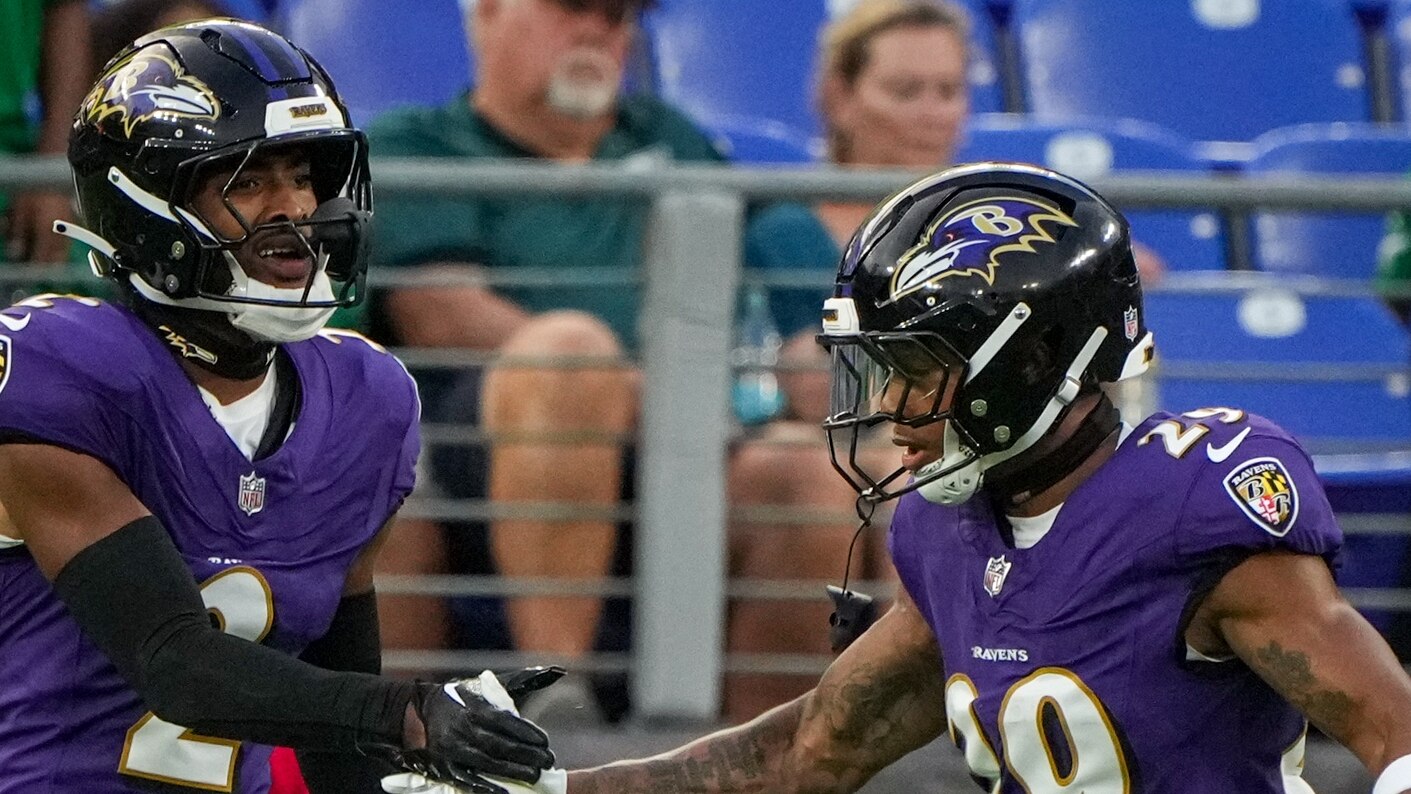 Baltimore Ravens cornerback Nate Wiggins (2) celebrates with safety Ar'Darius Washington (29) after blocking a pass attempt during the team’s preseason game against the Philadelphia Eagles at M&T Bank Stadium in Baltimore on Friday, August 09, 2024.