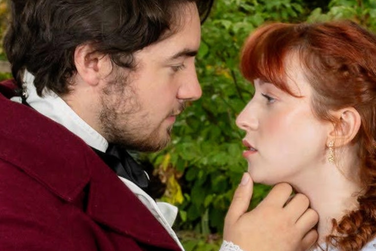 The Compass Rose production of "Pride and Prejudice" features Caleigh Riordan Davis as Elizabeth Bennet and Gaven Heglar as Mr. Darcy, surrounded by a cast of 10 supporting actors.