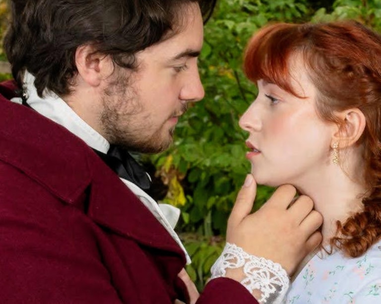 The Compass Rose production of "Pride and Prejudice" features Caleigh Riordan Davis as Elizabeth Bennet and Gaven Heglar as Mr. Darcy, surrounded by a cast of 10 supporting actors.