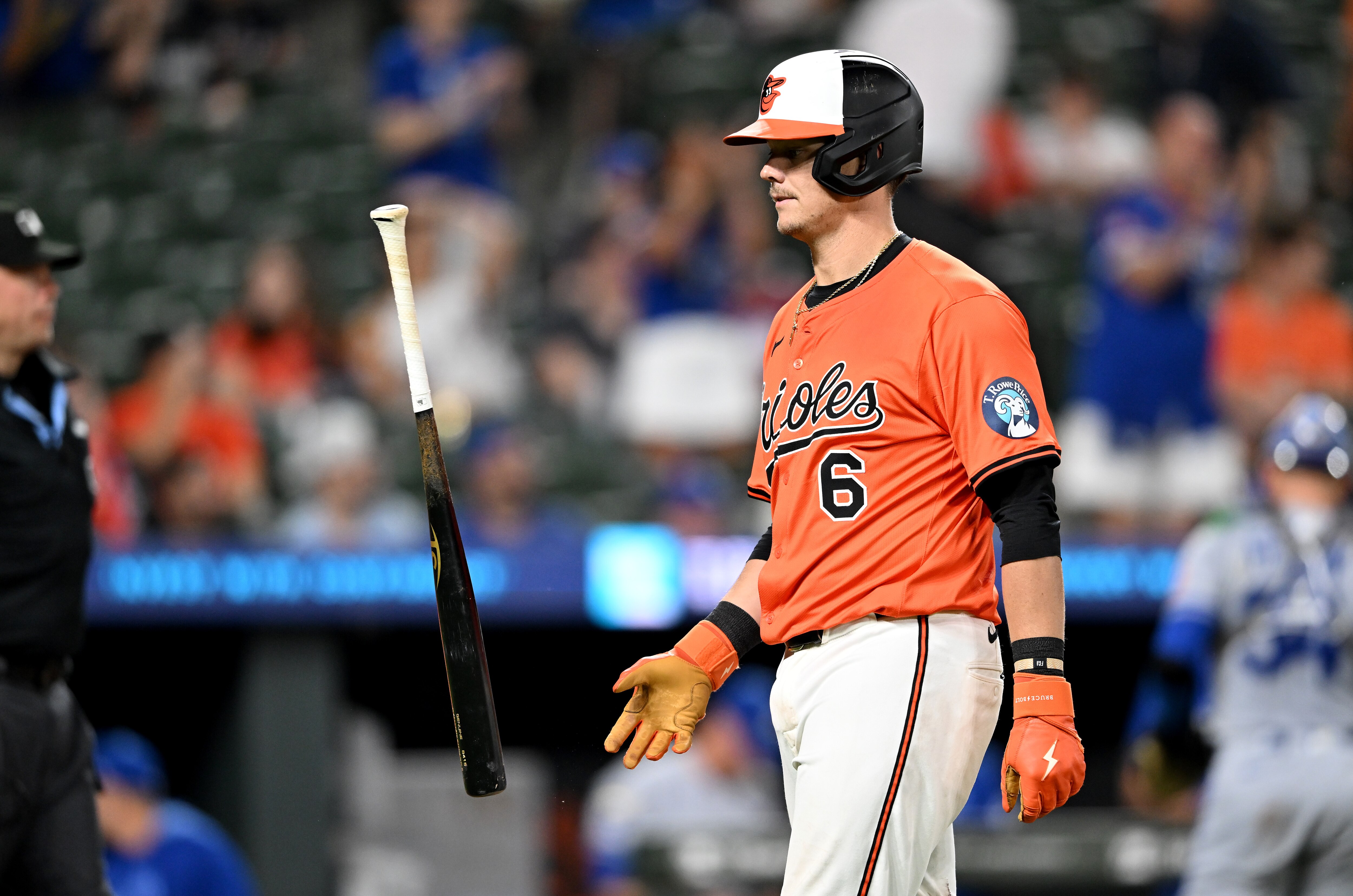 BALTIMORE, MARYLAND - MAY 03: Ryan Mountcastle #6 of the Baltimore Orioles flips his bat after being called out on strikes in the eighth inning against the Kansas City Royals at Oriole Park at Camden Yards on May 03, 2025 in Baltimore, Maryland.
