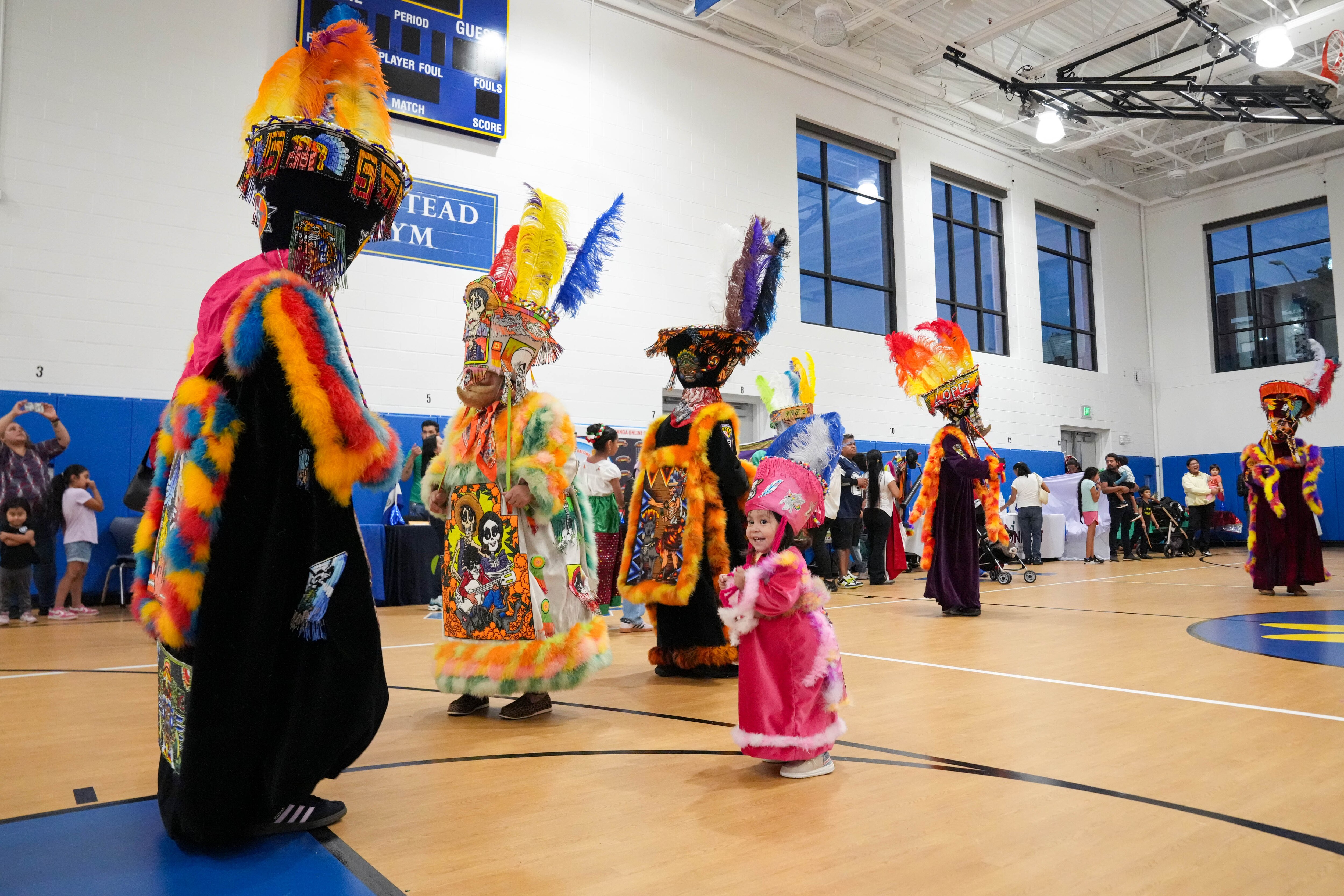 Dancers perform during a celebration of Hispanic Heritage Month at Hampstead Hill Academy in Baltimore on Friday. 