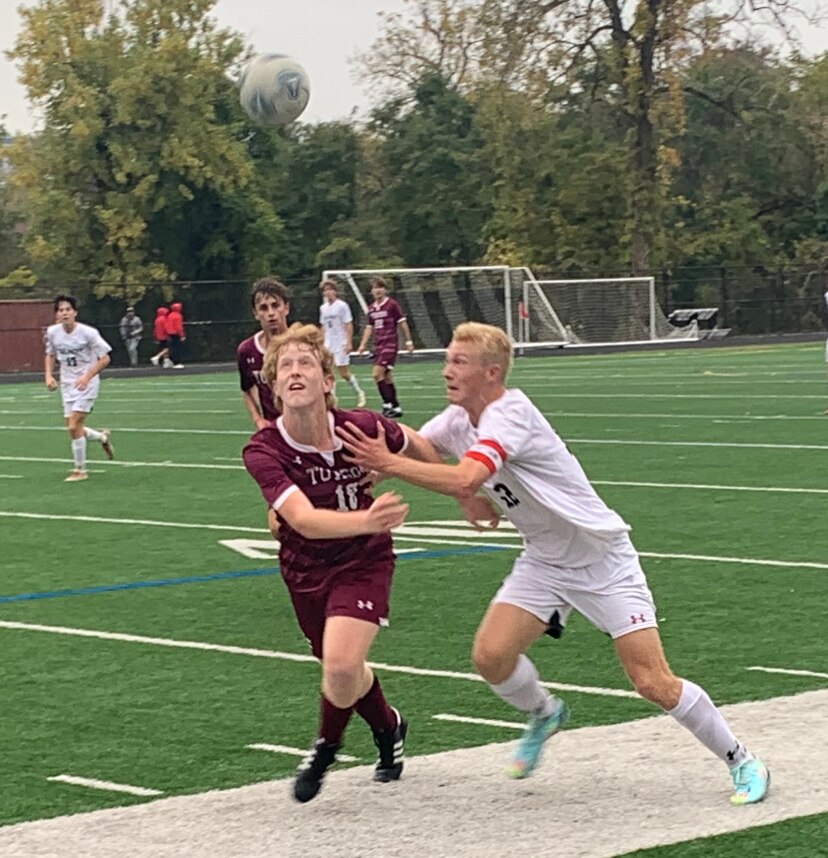 After battling for the Baltimore County boys soccer crown Tuesday, Towson's Jensen (left) and Dulaney's Joe Pinchney turn their sights to the state public tournament. Towson hosts Patapsco Wednesday in a Class 3A North Region II opening round match while Dulaney plays Friday at Parkville in a 4A North Region I semifinal.