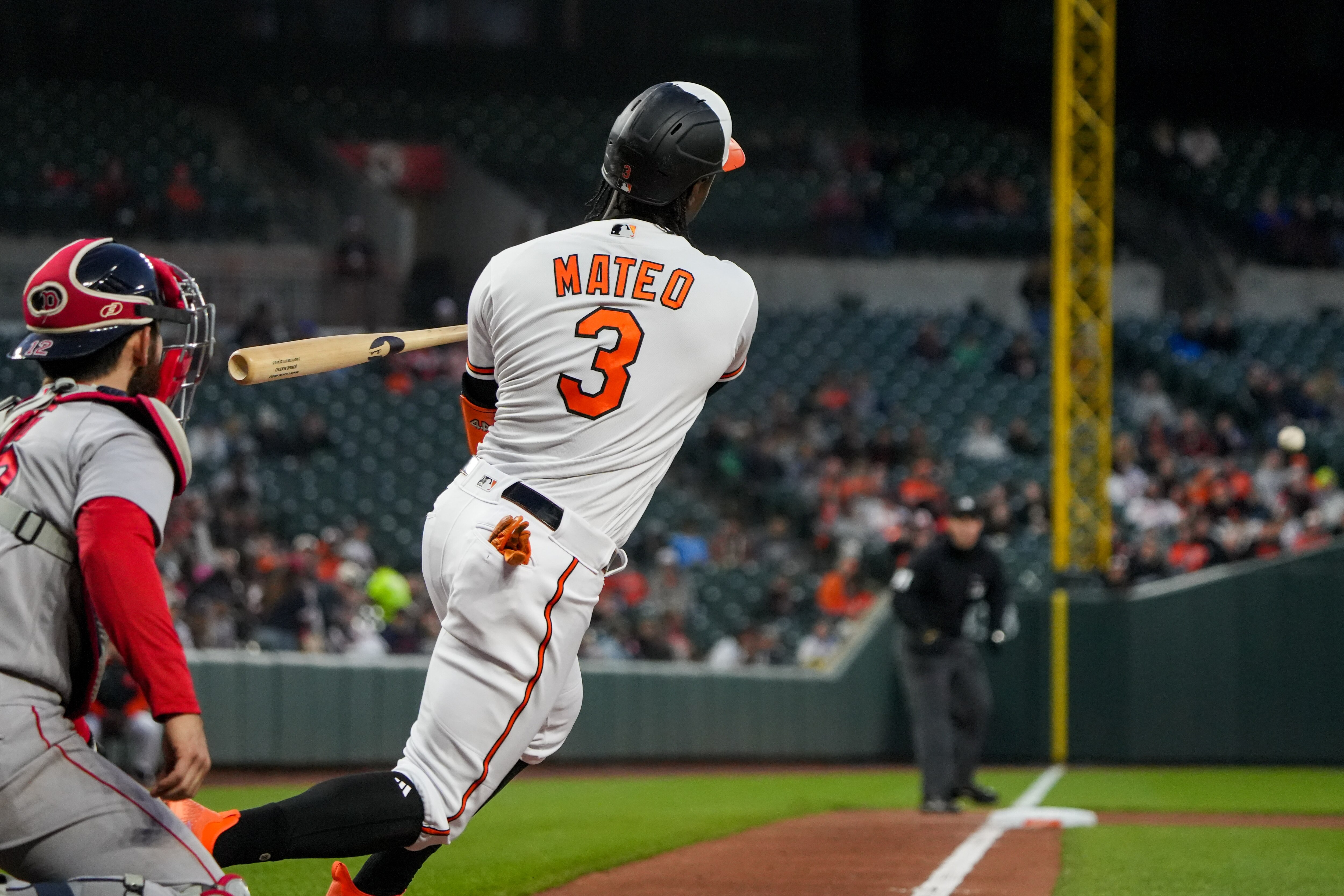 Baltimore Orioles shortstop Jorge Mateo (3) doubles in a baseball game against the Boston Red Sox at Camden Yards on Monday, April 24. The Orioles beat the Red Sox, 5-4, in the first game of the series.