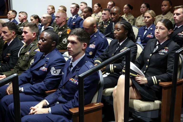 Members of the military listen as Secretary of Defense Pete Hegseth gives a State of the Force address at Marine Corps Base Quantico, Wednesday, Sept. 30, 2026 in Quantico, Va. (Alex Wong/Pool Photo via AP)