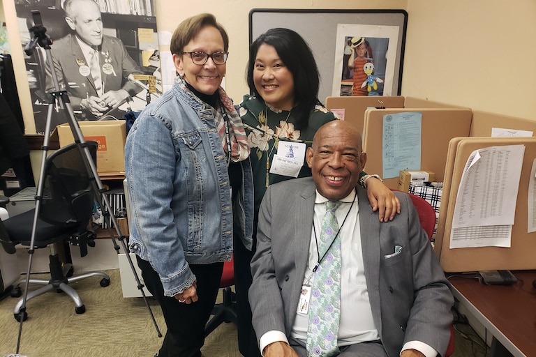 Charles Robinson with his MPT news and public affairs team colleagues Sue Kopen Katcef and Nancy Yamada in Annapolis in 2024.
