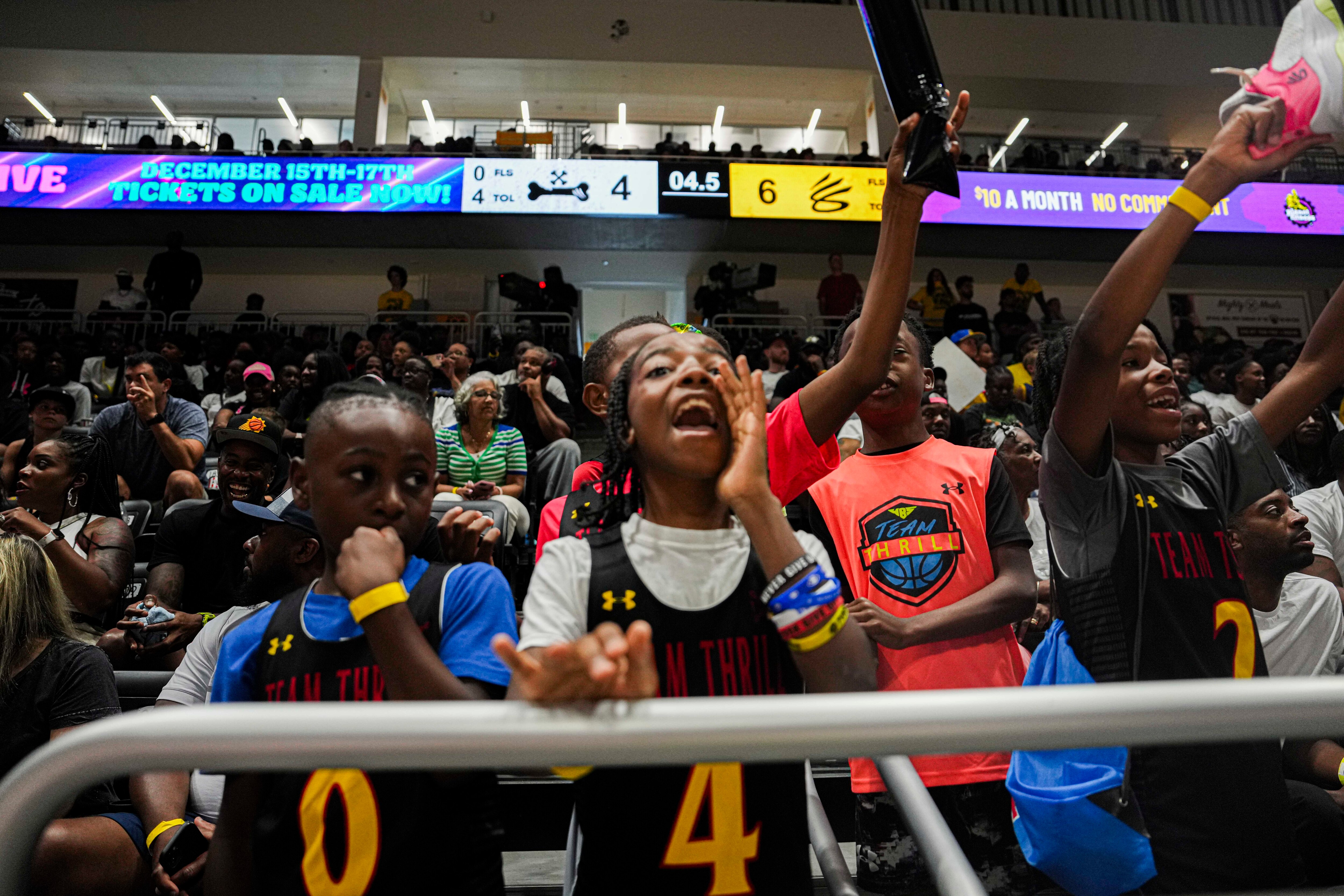 Children vie for the NBA superstar's attention, and autographs, at Stephen Curry's Baltimore Live Showcase at UMBC on Thursday afternoon.