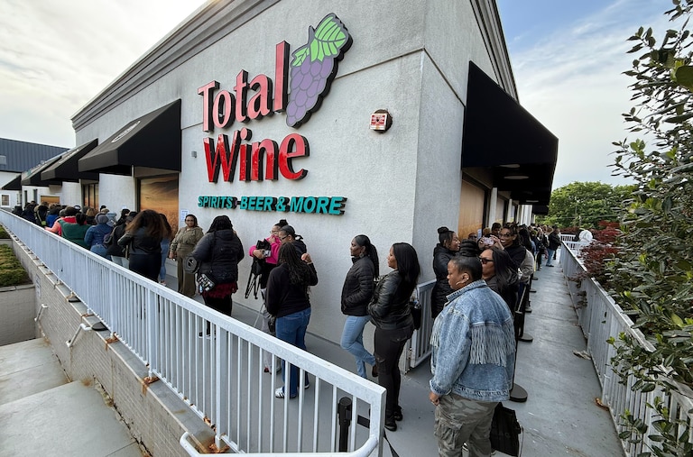 SATURDAY, MAY 2, 2026 - Lines of fans wrap around Total Wine and More in Towson for a Sable bourbon bottle signing event with Malcolm D. Lee and Morris Chestnut.